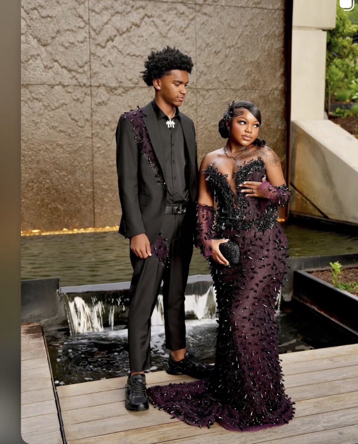 Prom couple in custom plum beaded gown