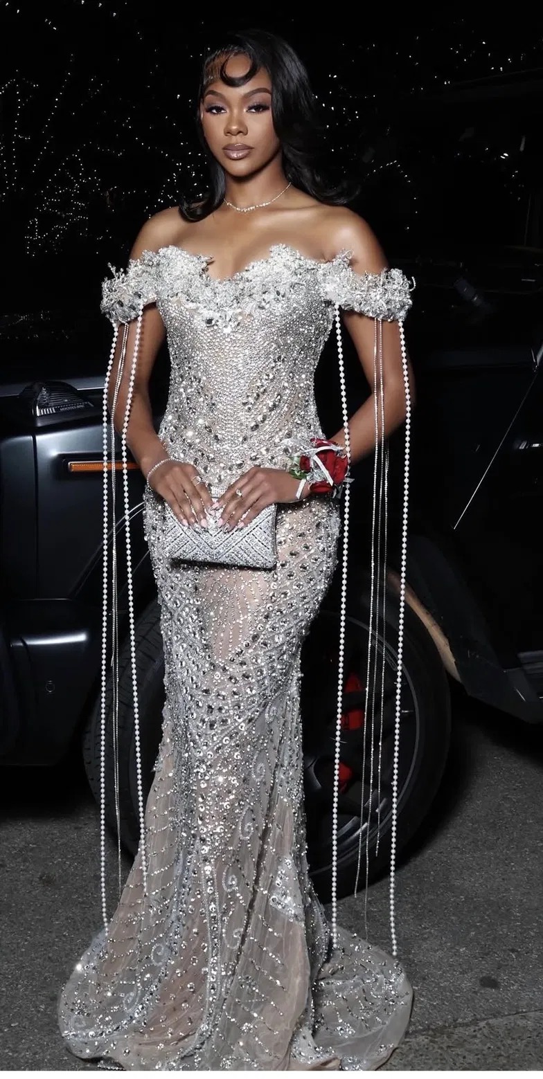 Prom gown in custom silver beaded design with pearl draping